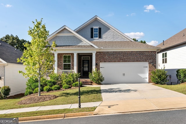 craftsman-style house with a front lawn and a garage