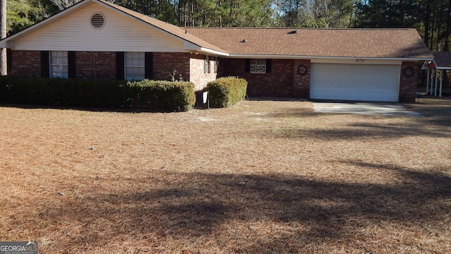 single story home with a garage