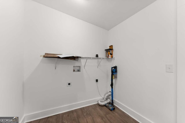 clothes washing area with electric dryer hookup, hookup for a washing machine, and dark hardwood / wood-style floors