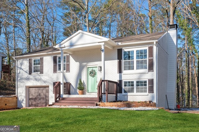 raised ranch with a garage