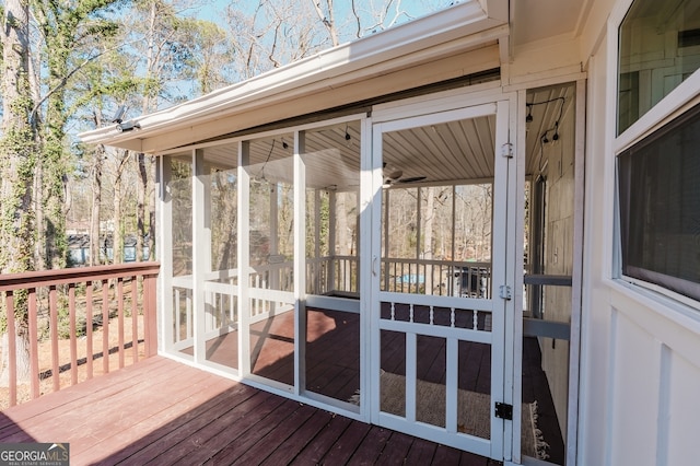 wooden terrace with a sunroom