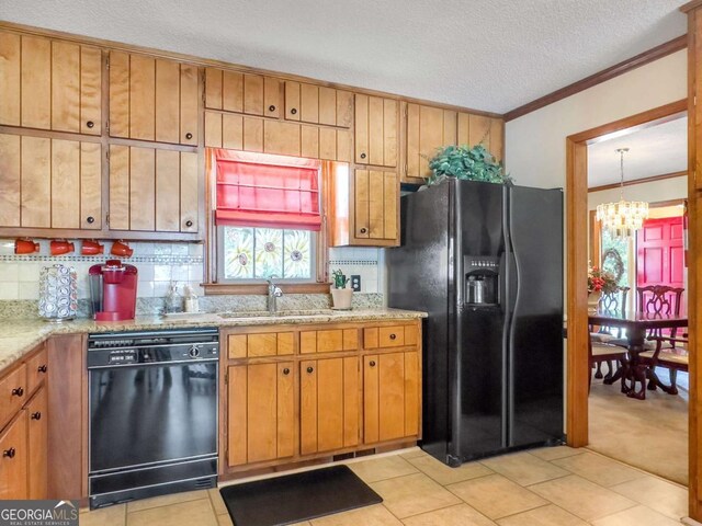 114 Tracy Ln, Mcdonough, GA 30253 - kitchen featuring backsplash, a sink, a chandelier, black appliances, and ornamental molding