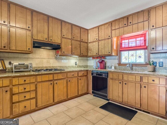 114 Tracy Ln, Mcdonough, GA 30253 - kitchen featuring stainless steel gas cooktop, a sink, dishwasher, under cabinet range hood, and a toaster
