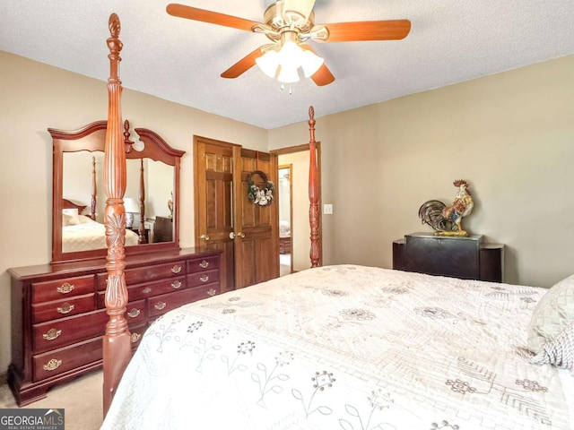 114 Tracy Ln, Mcdonough, GA 30253 - carpeted bedroom with ceiling fan and a textured ceiling
