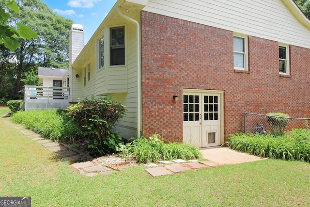 exterior space with a yard