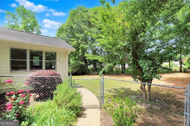 114 Tracy Ln, Mcdonough, GA 30253 - view of yard featuring a gate and fence