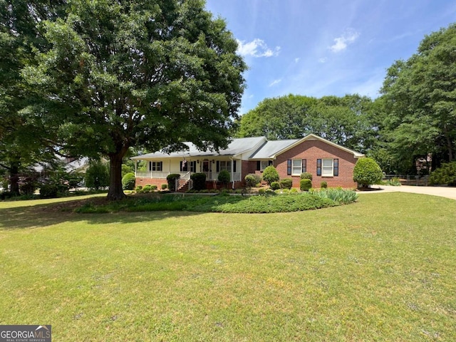 114 Tracy Ln, Mcdonough, GA 30253 - single story home with brick siding, a front yard, and covered porch