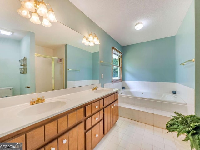 full bathroom featuring a textured ceiling, toilet, independent shower and bath, vanity, and a chandelier