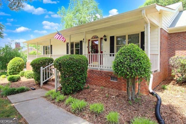114 Tracy Ln, Mcdonough, GA 30253 - view of front of property featuring crawl space, covered porch, and brick siding