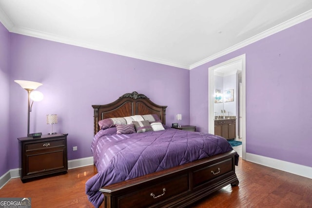 bedroom with ensuite bathroom, crown molding, and dark hardwood / wood-style floors