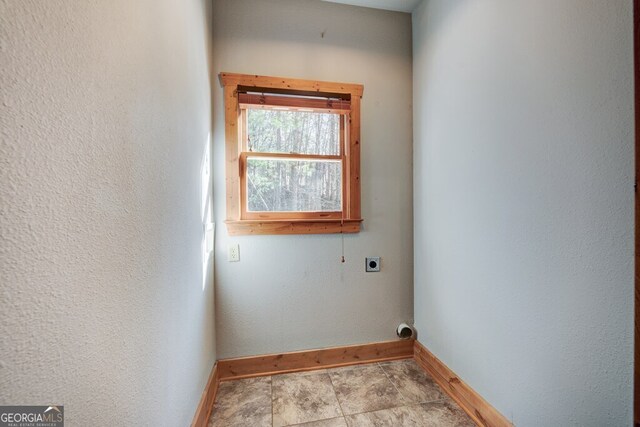 washroom featuring hookup for an electric dryer