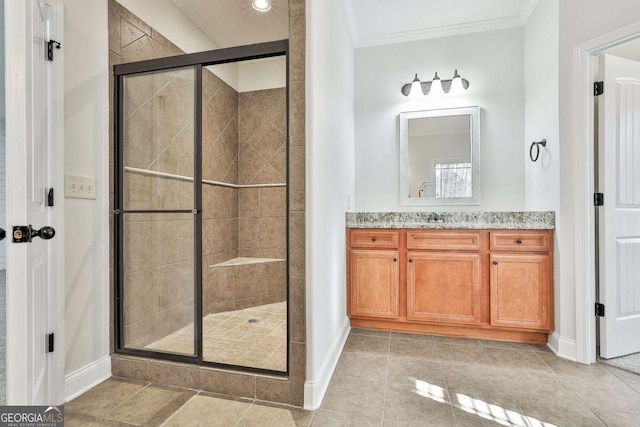 bathroom with vanity, walk in shower, and crown molding