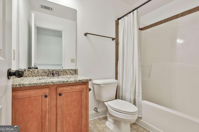 full bathroom featuring toilet, vanity, and shower / bath combo