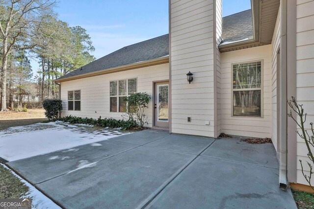 rear view of property with a patio