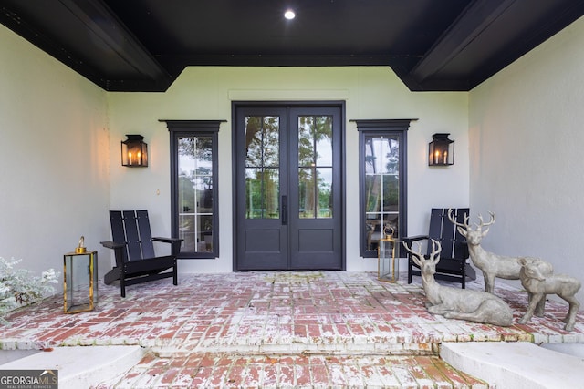 doorway to property featuring french doors and a patio