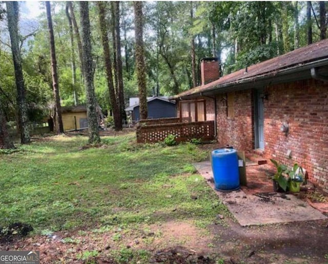 view of yard featuring a deck