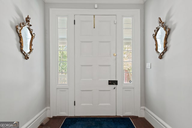 entryway with dark hardwood / wood-style floors