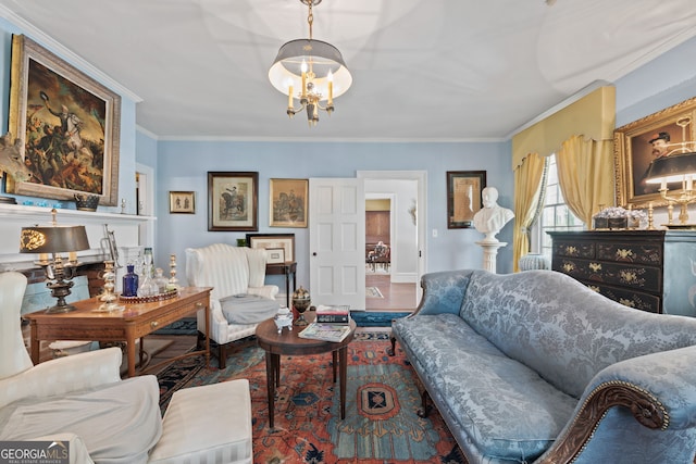 living room with ornamental molding and a notable chandelier