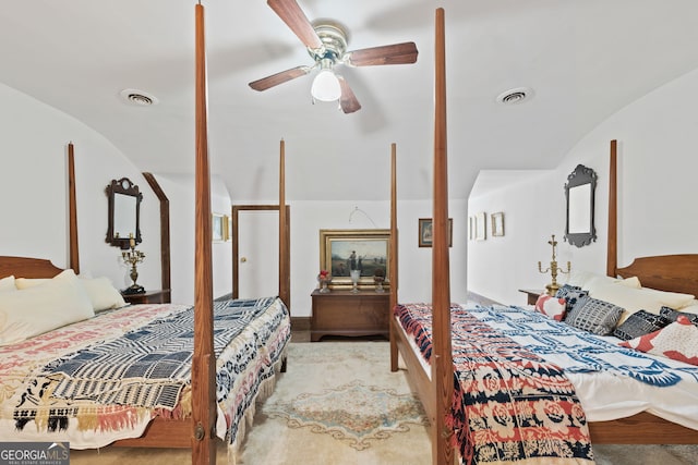 bedroom featuring ceiling fan and vaulted ceiling