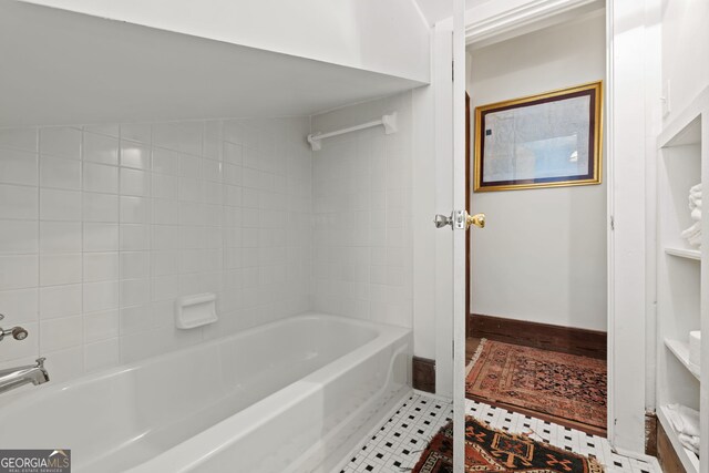 bathroom featuring tile patterned flooring