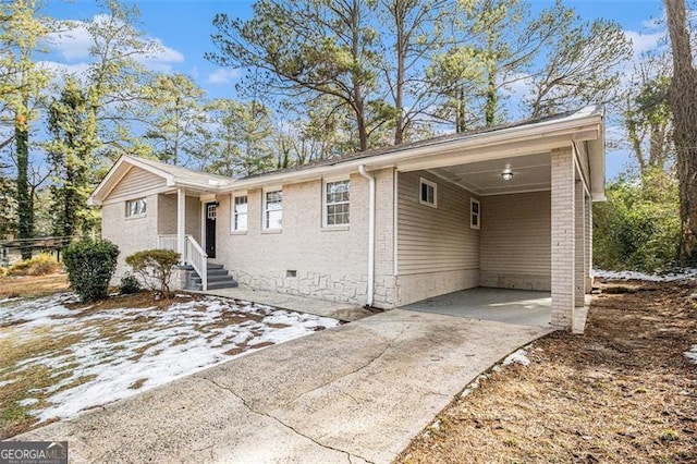 single story home with a carport