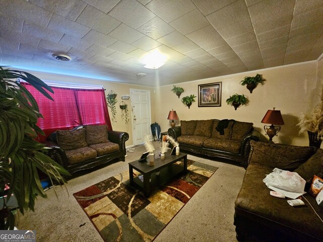 living room featuring crown molding and carpet flooring