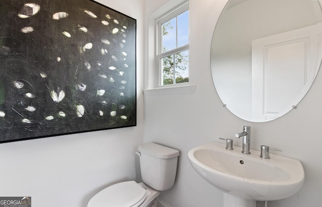 bathroom featuring sink and toilet