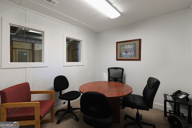 carpeted office featuring ornamental molding