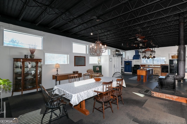 dining space with a high ceiling