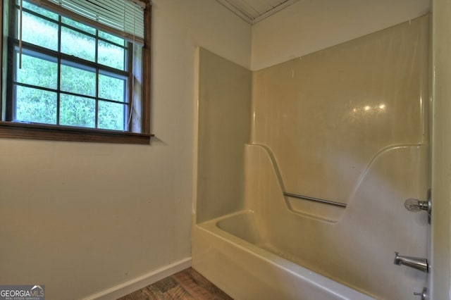 bathroom with  shower combination and hardwood / wood-style floors