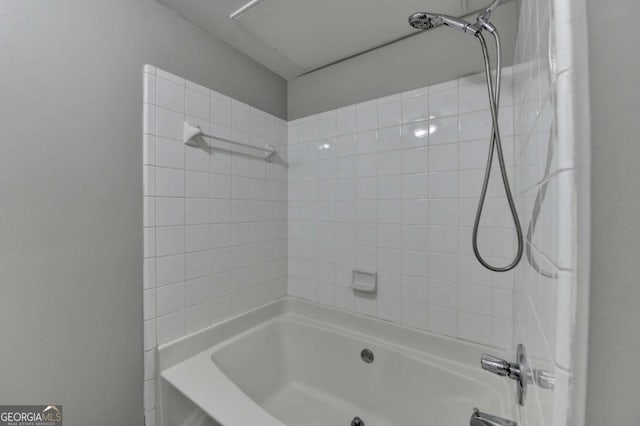 bathroom with shower / bath combination