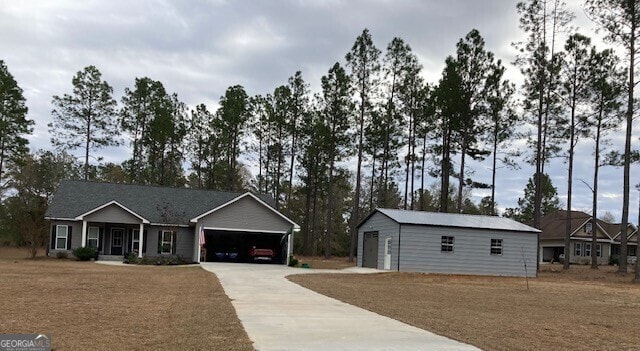 ranch-style house featuring a garage