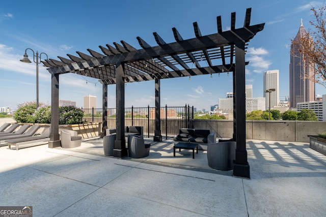 view of patio / terrace featuring outdoor lounge area and a pergola