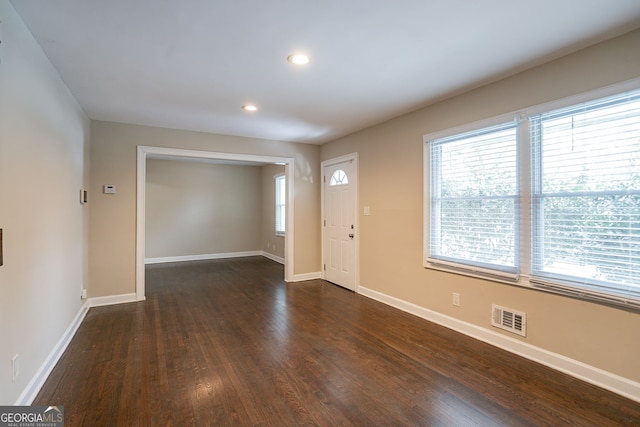 foyer entrance featuring dark hardwood / wood-style flooring