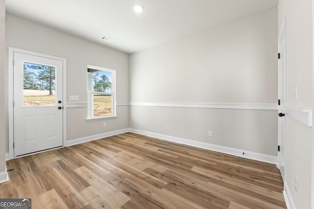 entrance foyer featuring light hardwood / wood-style floors