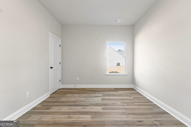 empty room featuring light hardwood / wood-style floors