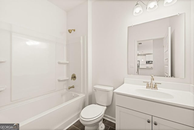 full bathroom with bathing tub / shower combination, vanity, and toilet