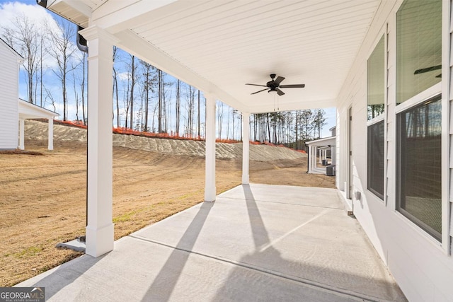 view of patio featuring ceiling fan