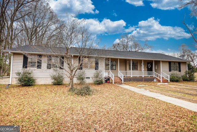 single story home with a porch and a front lawn