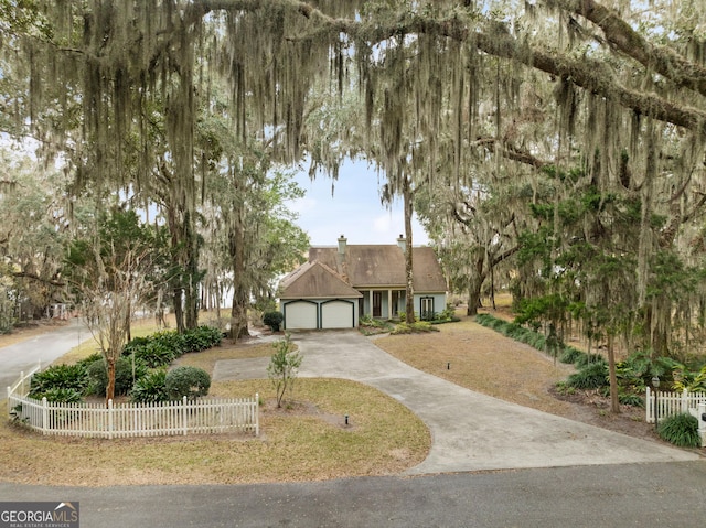 view of front of property with a garage