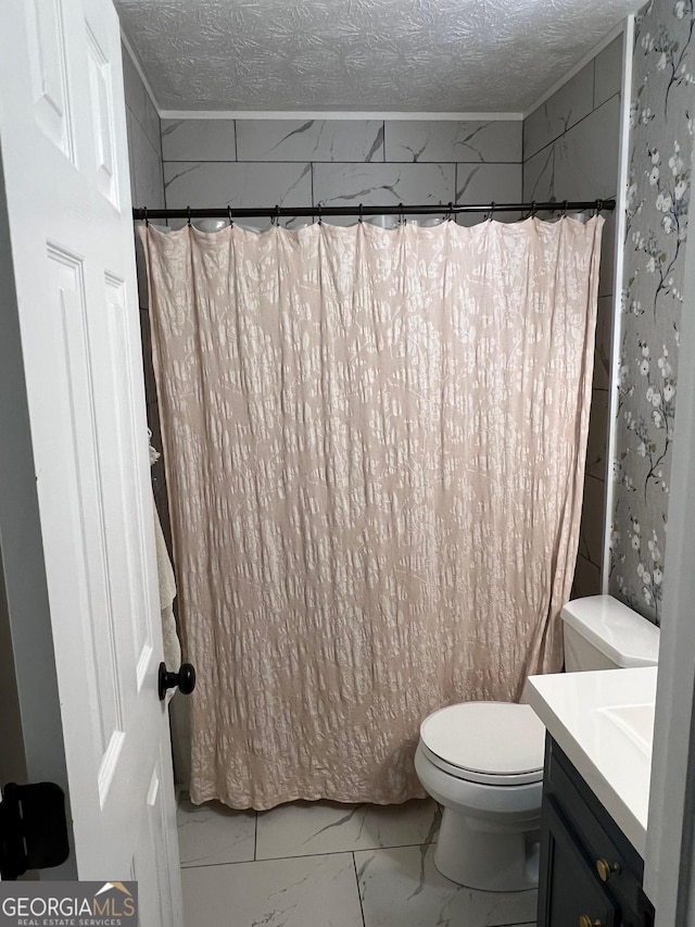 bathroom featuring toilet, vanity, a textured ceiling, and walk in shower