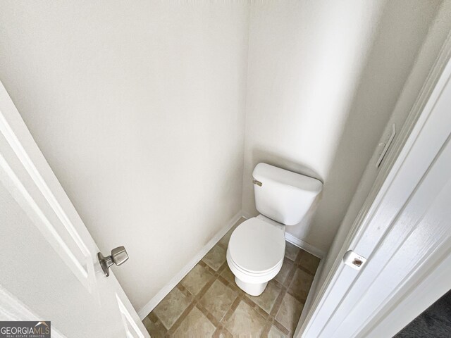 bathroom featuring toilet