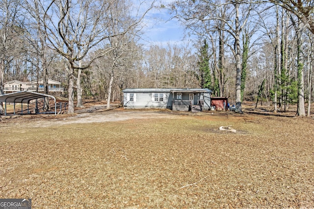 exterior space featuring a carport