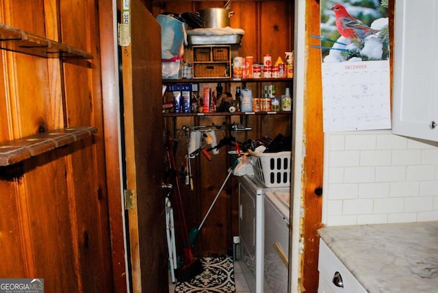 pantry with separate washer and dryer