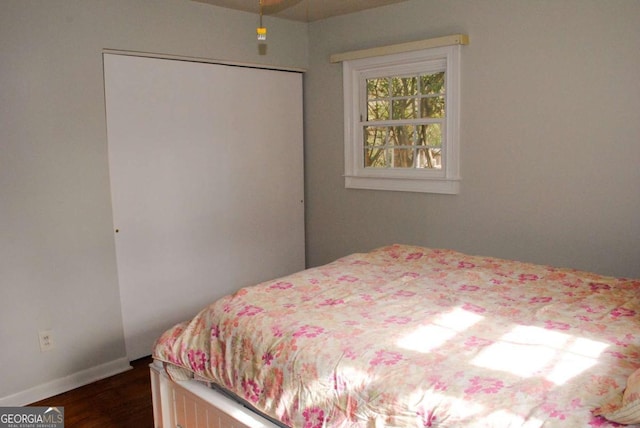 bedroom featuring dark hardwood / wood-style floors