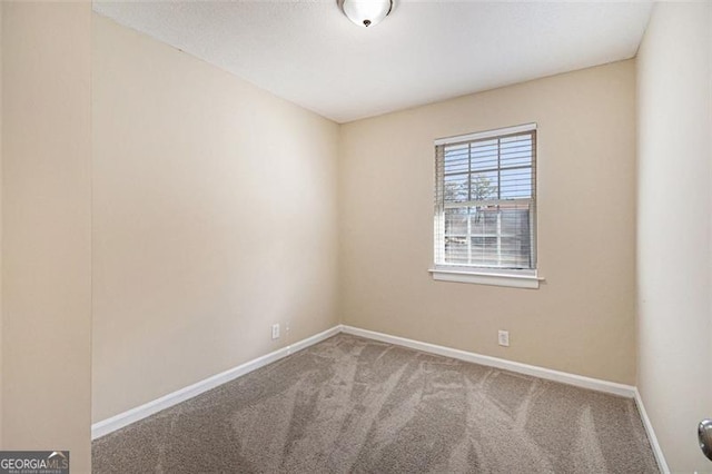 view of carpeted spare room