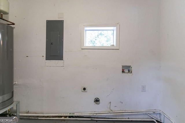 clothes washing area with water heater, washer hookup, electric panel, and hookup for an electric dryer