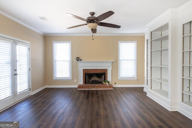 unfurnished living room featuring ornamental molding, ceiling fan, built in features, and dark wood-type flooring