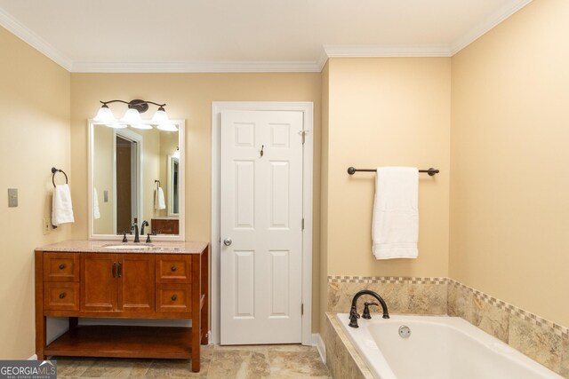 bathroom featuring a relaxing tiled tub, crown molding, and vanity