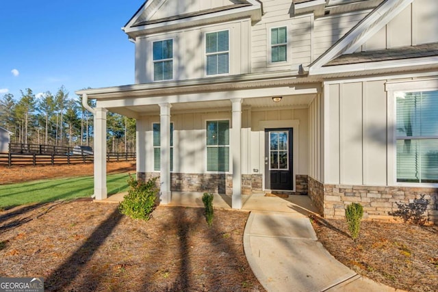 entrance to property with a porch